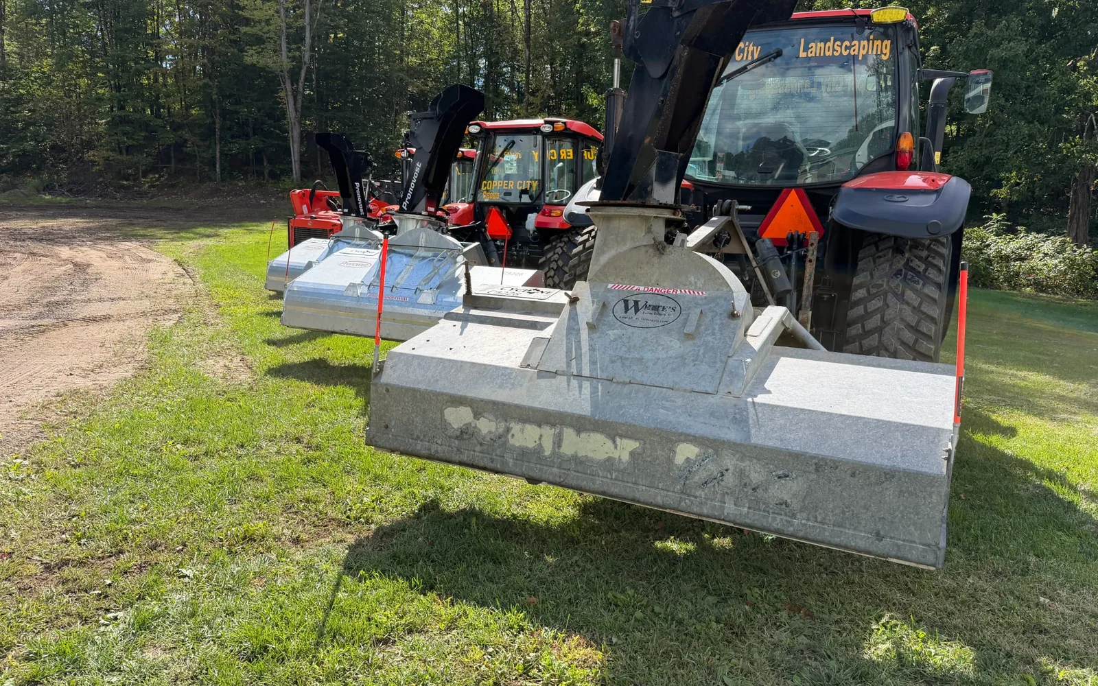 Copper City Landscaping brush hogging equipment